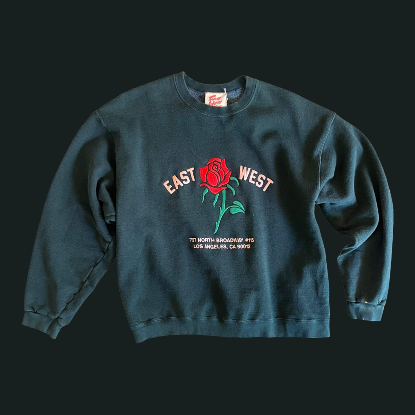 Vintage Sweatshirt with raglan sleeves.  Embroidered with Rose and reads “East West 727 N. Broadway #115, Los Angeles, CA 90012”