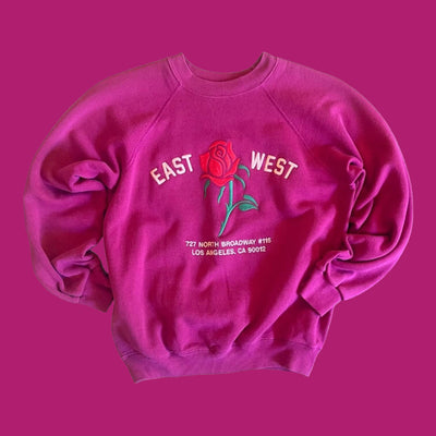 Vintage Sweatshirt with raglan sleeves.  Embroidered with Rose and reads “East West 727 N. Broadway #115, Los Angeles, CA 90012”