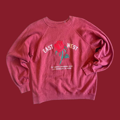 Vintage Sweatshirt with raglan sleeves.  Embroidered with Rose and reads “East West 727 N. Broadway #115, Los Angeles, CA 90012”