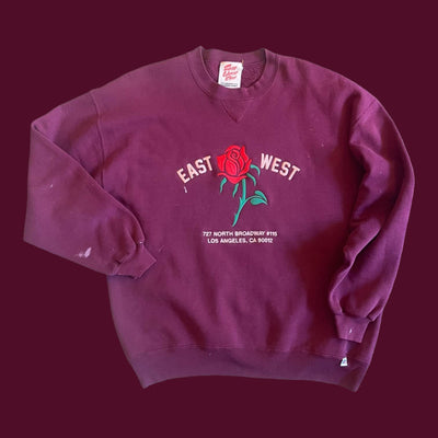 Vintage Sweatshirt with set in sleeves.  Embroidered with Rose and reads “East West 727 N. Broadway #115, Los Angeles, CA 90012”