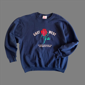 Vintage Sweatshirt with set in sleeves.  Embroidered with Rose and reads “East West 727 N. Broadway #115, Los Angeles, CA 90012”