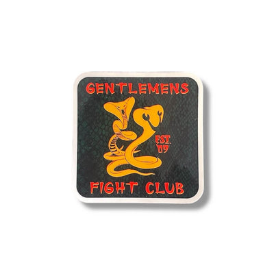 Black sticker with snakeskin texture in the background with red font and yellow snake.  Reads Gentlemen's Fight Club Est. 09